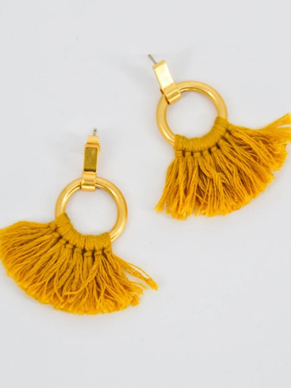 Madewell tassel statement